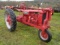 Farmall F14 Antique Tractor, Single Front Wheel, Was Restored And Parked In