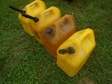 4 Yellow Fuel Cans