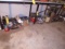 Contents On Floor Under Bench To Left Of Red Cabinents