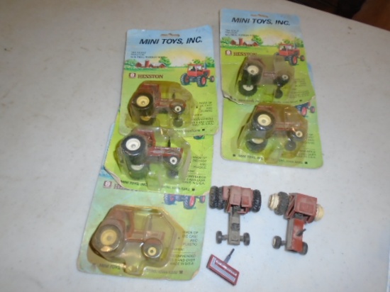 (7) Hesston 1/64 Tractors