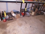 Contents On Floor Under Bench To Left Of Red Cabinents