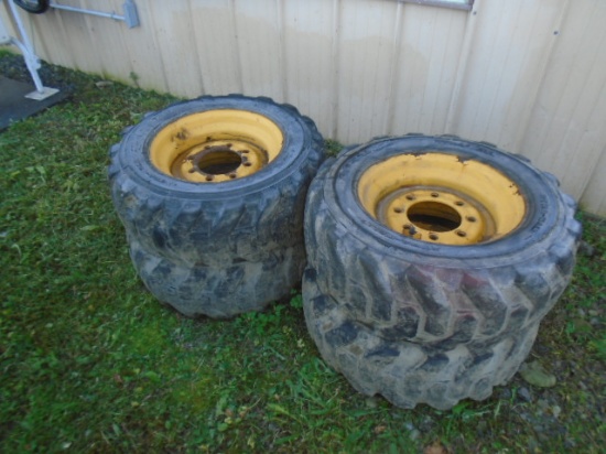 Set Of 4 Used 10-16.5 SSL Tires On Yellow 8 Bolt Rims