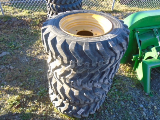 (4) New 12-16.5 Skid Steer Tires On Yellow 8 Bolt Rims
