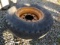 11L-16 Tire On 8 Lug Rim For Front Of 2wd Backhoe