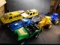 Box Of Plastic Toy Vehicles