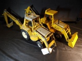 (2) International Backhoes