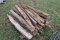 Pile Of 24 Sharpened Fence Posts