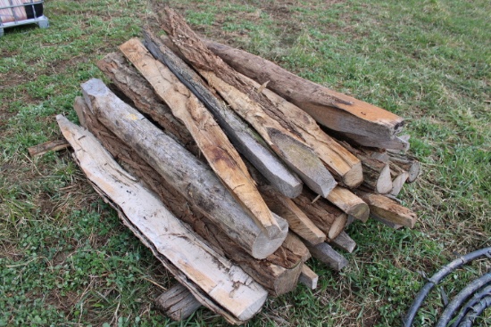 Pile Of 24 Sharpened Fence Posts
