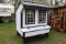 White & Black Chicken Coop On Skids