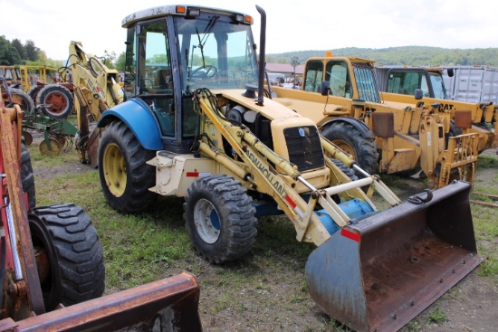 New Holland 555E 4wd Backhoe, EROPS, Frotn Aux Hydraulics, Rear Wrist-o-Twi