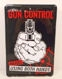 GUN CONTROL FUNNY EMBOSSED METAL SIGN