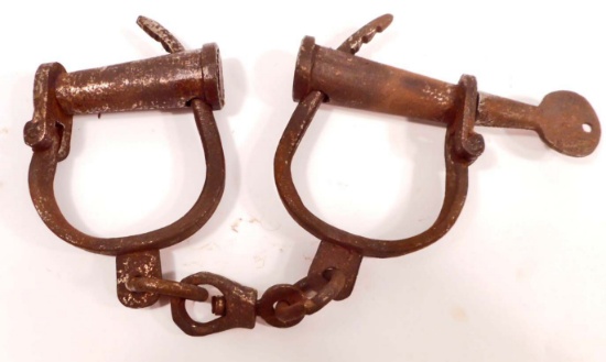 PAIR OF CAST IRON HANDCUFFS