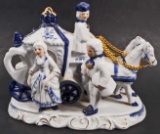 VINTAGE BLUE & WHITE FIGURINE OF HORSE DRAWN CARRAGE