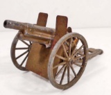 VINTAGE METAL SPRING LOADED TOY CANNON
