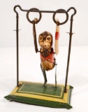 VINTAGE C. 1950'S TIN LITHO WIND-UP FLIPPING TOY MONKEY