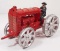 VINTAGE CAST IRON TRACTOR W/ MAN