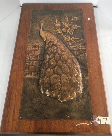 COPPER SWELL BODIED PEACOCK PLAQUE ON WOOD.