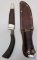 (2) Marked Fixed Blade Knives with Leather Sheaths