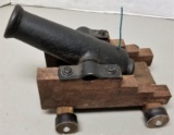 Small Unmarked Cannon on Wooden Base