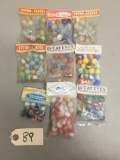 (9) Packs of Unopened Souvenir Marbles