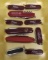 10 Assorted Swiss Army type knives,