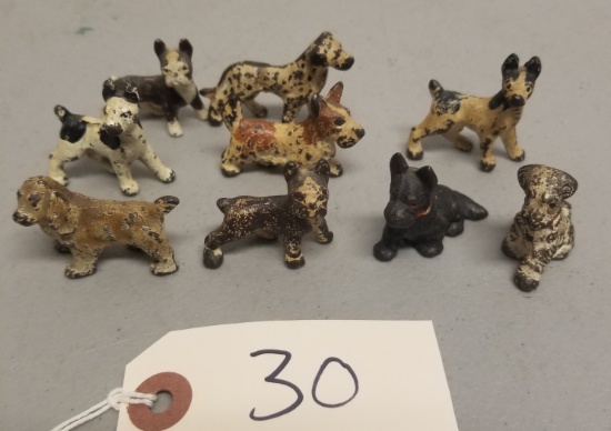 9 Miniature Cast Iron Dogs,