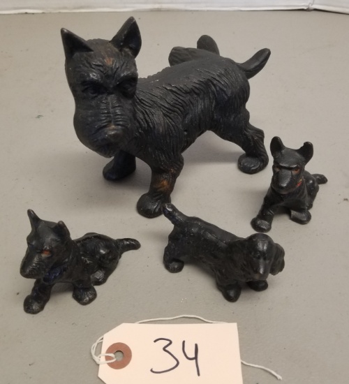 4 Cast Iron Terrier Figures,