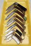 (9) Assorted Wooden Handled Pocket Knives