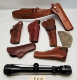 7 Used Leather Holsters & Tasco Pronghorn Rifle Scope