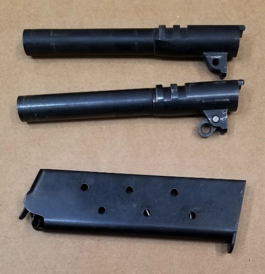 (2) Colt 45 Auto Barrels And Magazine