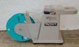 Tach-it Twist Tie Machine