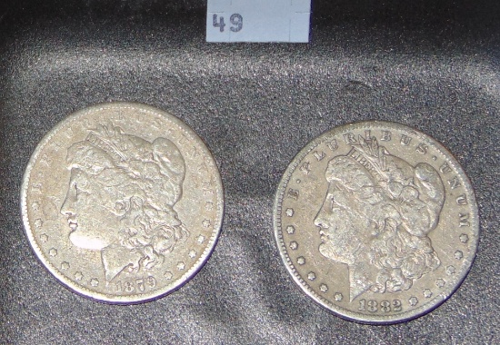 1879, 1882-S Morgan Dollars.