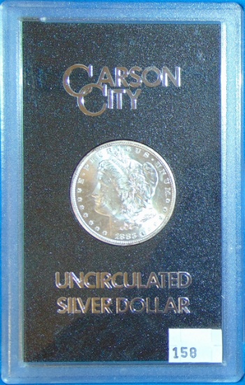 1883CC UNC Morgan Dollar (box and paper).