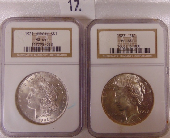 1921 Morgan Dollar. 1923 Peace Dollar.