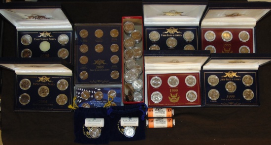 Approx. $58 in State Quarters: various packaging.