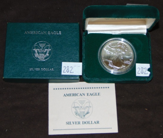 1989 Silver Eagle (in original box with COA).