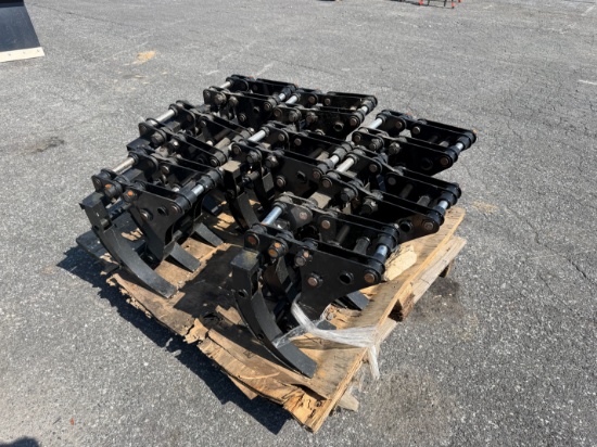 Skid Lot Of (8) New Mini Excavator Attachments