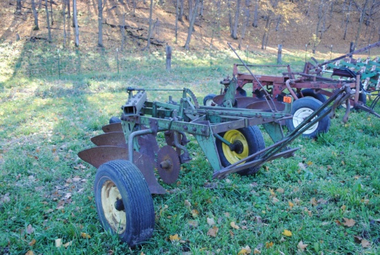 John Deere 3-16" with coulters, hydraulic lift, good tires, nice plow, (owner thinks it's a 55)