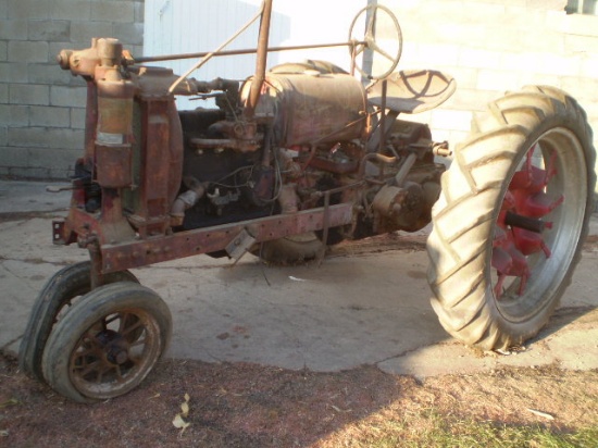 F14, rear cut-offs, parts tractor. Rear brakes froze up, tires slide. Not running. This tractor had