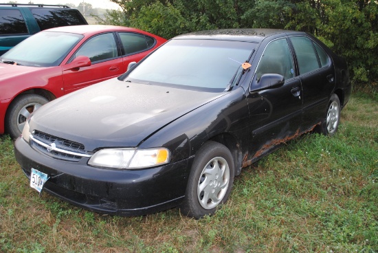 1999 Nissan Altima, 4-door, approx. 236,000 miles, runs