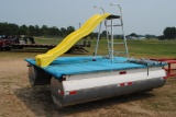 Swim raft with slide on pontoon floats