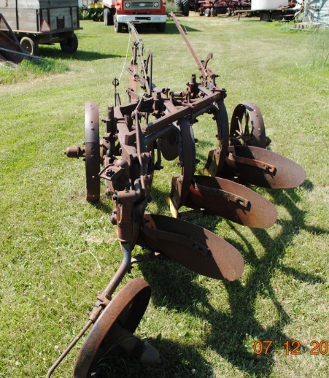 All steel plow, 3-14" bottoms, trip lift;