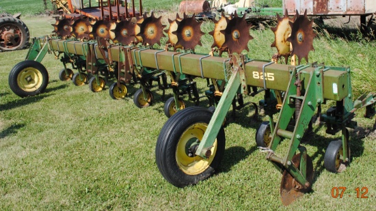 John Deere 825 8-row, 30" crop cultivator w/rolling shields;