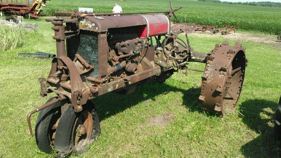 Farmall regular parts tractor, steel rear, rubber front;
