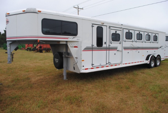 2001 Sundowner 5-horse slant trailer, 38' total length, unfinished living quarters that has 5' short
