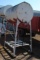 Approximately 300 gallon fuel barrel on stand