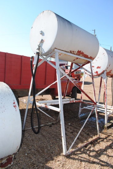 Approximately 300 gallon fuel barrel on stand