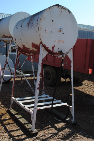 Approximately 300 gallon fuel barrel on stand