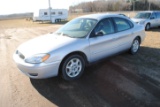 2005 Ford Taurus, 4-door, power locks, silver in color, runs, 124,939 miles, VIN #1FAFP532X5A311894