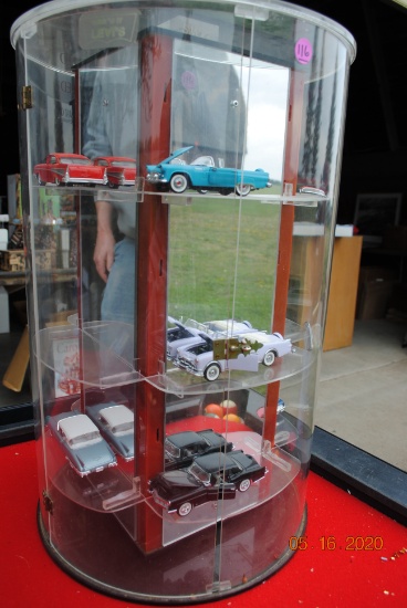 Display case with vintage cars